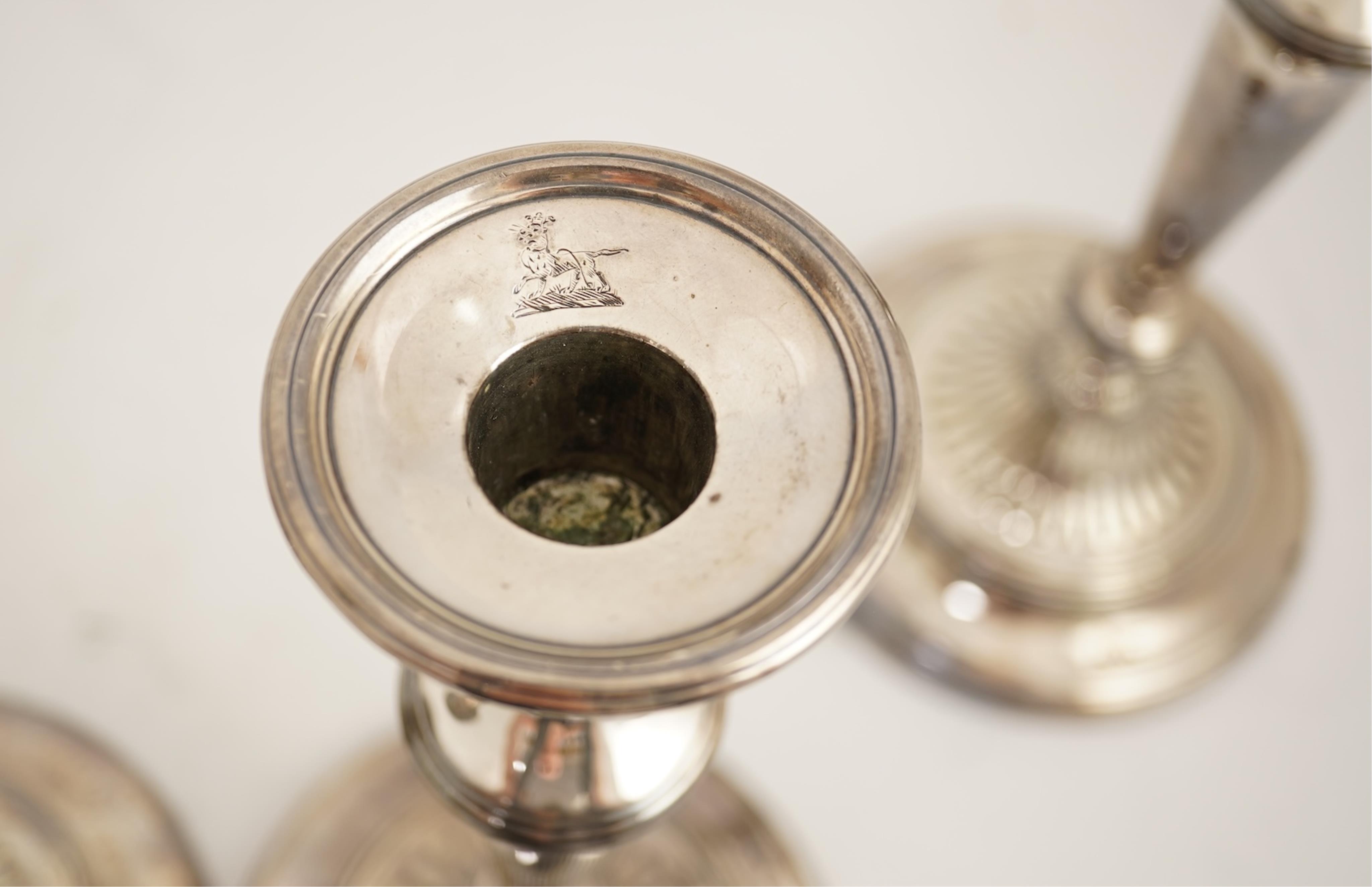 A set of four George III silver candlesticks by John Green, Roberts, Mosley & Co